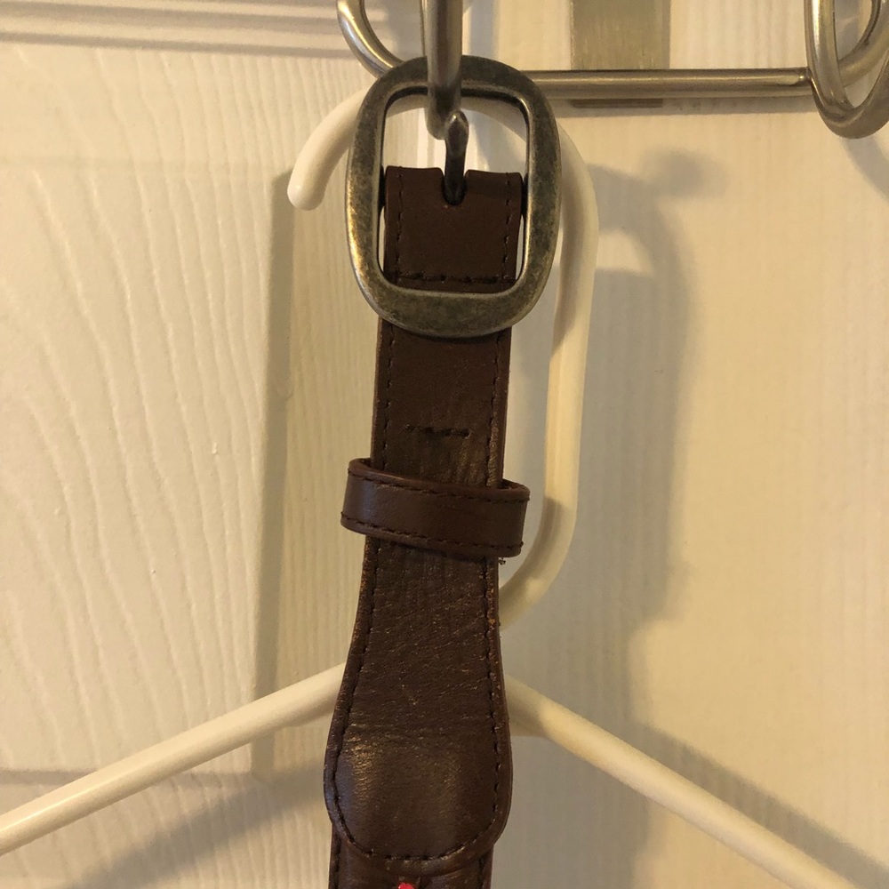 Brown leather belt with red detail